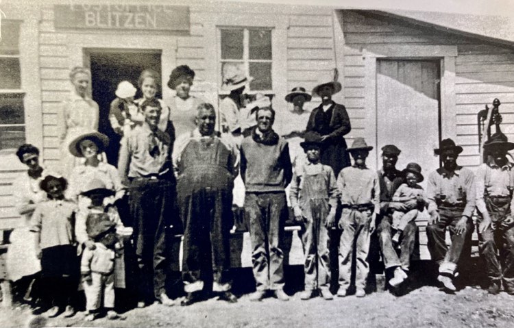 The townfolk of Blitzen in front of the post office